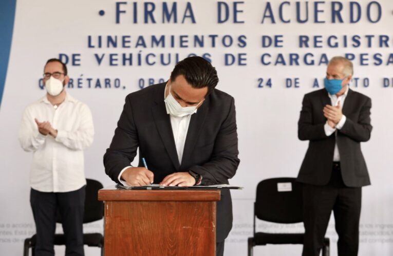 Firman acuerdo para prohibir transporte pesado en vías municipales de Querétaro